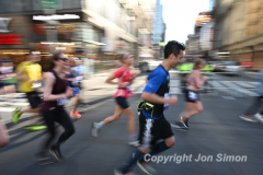 March 20, 2022: The 2022 United Airlines NYC Half Marathon is held in New York City. The course starts in Prospect Park in Brooklyn and ends in Central Park in Manhattan. The Rising New York Road Runner races in Times Square. (Photos by Jon Simon)
