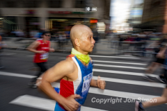 March 20, 2022: The 2022 United Airlines NYC Half Marathon is held in New York City. The course starts in Prospect Park in Brooklyn and ends in Central Park in Manhattan. The Rising New York Road Runner races in Times Square. (Photos by Jon Simon)