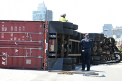 A tractor trailer flippied over and spilled 100's of gallons of fuel on the Brooklyn- Queens Expressway on Monday, April, 26th.