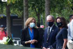 Kathy Hochul, Governor of New York, and Michael Bloomberg, founder of Bloomberg LP, right, lay flowers over the inscribed names of those who were killed in the 2001 and 1993 terrorist attacks at the edge of a memorial pool at the National September 11 Memorial & Museum in New York, U.S., on Wednesday, Sept. 8, 2021. This year marks the 20th anniversary of the attacks on the World Trade Center towers in New York
