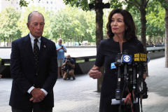 Michael Bloomberg, founder of Bloomberg LP and former Mayor of New York City and Kathy Hochul, Governor of New York, speak during a news conference at the National September 11 Memorial & Museum in New York, U.S., on Wednesday, Sept. 8, 2021. This year marks the 20th anniversary of the attacks on the World Trade Center towers in New York.