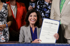 Governor Kathy Hochul today signed a legislative package of three bills that will strengthen New York's commitment to clean energy development and energy efficiency, while reducing greenhouse gas emissions. The Governor signed the bills at Newlab headquarters in Brooklyn alongside State Senator Kevin Parker (district 21), State Senator Jessica Ramos, Assemblymember Pat Fahy, Assemblymember Latoya Joyner, and key labor leaders and climate advocates. On July 5, 2022, in Brooklyn, NY, at the Brooklyn Navy Yard. Photo by Erica Price