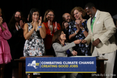 Governor Kathy Hochul today signed a legislative package of three bills that will strengthen New York's commitment to clean energy development and energy efficiency, while reducing greenhouse gas emissions. The Governor signed the bills at Newlab headquarters in Brooklyn alongside State Senator Kevin Parker (district 21), State Senator Jessica Ramos, Assemblymember Pat Fahy, Assemblymember Latoya Joyner, and key labor leaders and climate advocates. On July 5, 2022, in Brooklyn, NY, at the Brooklyn Navy Yard. Photo by Erica Price