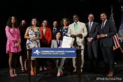 Governor Kathy Hochul today signed a legislative package of three bills that will strengthen New York's commitment to clean energy development and energy efficiency, while reducing greenhouse gas emissions. The Governor signed the bills at Newlab headquarters in Brooklyn alongside State Senator Kevin Parker (district 21), State Senator Jessica Ramos, Assemblymember Pat Fahy, Assemblymember Latoya Joyner, and key labor leaders and climate advocates. On July 5, 2022, in Brooklyn, NY, at the Brooklyn Navy Yard. Photo by Erica Price