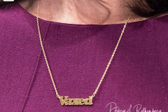 Close up of Governor Kathy Hochul's necklace that says "Vaxed" when she updated New Yorkers on the state's progress combating COVID-19 during a press conference at her office in New York City on 02 Dec 2021