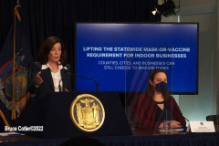 February 9, 2022  New York   Gov. Kathy Hochul  in a press conference today in her N.Y.C. office said she is lifting the state’s business mask mandate on Thursday February 10,2022 as New York emerges from a deadly wave of Omicron cases — but will still require them in schools for now.