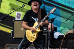 Guitar legend Carlos Santana performs for the crowd attending the "We Love NYC Homecoming Concert" on the Great Lawn in Central Park.(Photo by Gabriele Holtermann)