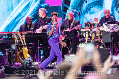 Jon Batiste performs for the crowd attending the "We Love NYC Homecoming Concert" on the Great Lawn in Central Park. (Photo by Gabriele Holtermann)