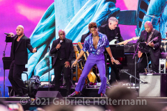 Jon Batiste performs for the crowd attending the "We Love NYC Homecoming Concert" on the Great Lawn in Central Park.(Photo by Gabriele Holtermann)