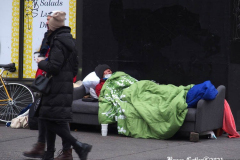 December 27, 2021  New York , homeless person found a sofa that was tossed out in the trash and is using it as his bed in the streets of New York City.