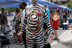 New York 8th annual Body Painting Day.cover 50 artists and models came out to showcase there talent and paint living canvasses after the painting portion of the event they all walked down 5th ave to Washington Square park to pose for photographs and then boarded a Double Decker bus to Bushwick Brooklyn to celebrate.