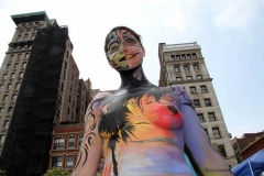 New York 8th annual Body Painting Day.cover 50 artists and models came out to showcase there talent and paint living canvasses after the painting portion of the event they all walked down 5th ave to Washington Square park to pose for photographs and then boarded a Double Decker bus to Bushwick Brooklyn to celebrate.