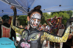 New York 8th annual Body Painting Day.cover 50 artists and models came out to showcase there talent and paint living canvasses after the painting portion of the event they all walked down 5th ave to Washington Square park to pose for photographs and then boarded a Double Decker bus to Bushwick Brooklyn to celebrate.