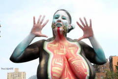 New York 8th annual Body Painting Day.cover 50 artists and models came out to showcase there talent and paint living canvasses after the painting portion of the event they all walked down 5th ave to Washington Square park to pose for photographs and then boarded a Double Decker bus to Bushwick Brooklyn to celebrate.