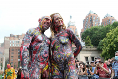 New York 8th annual Body Painting Day.cover 50 artists and models came out to showcase there talent and paint living canvasses after the painting portion of the event they all walked down 5th ave to Washington Square park to pose for photographs and then boarded a Double Decker bus to Bushwick Brooklyn to celebrate.
