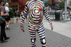 New York 8th annual Body Painting Day.cover 50 artists and models came out to showcase there talent and paint living canvasses after the painting portion of the event they all walked down 5th ave to Washington Square park to pose for photographs and then boarded a Double Decker bus to Bushwick Brooklyn to celebrate.