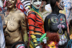 New York 8th annual Body Painting Day.cover 50 artists and models came out to showcase there talent and paint living canvasses after the painting portion of the event they all walked down 5th ave to Washington Square park to pose for photographs and then boarded a Double Decker bus to Bushwick Brooklyn to celebrate.
