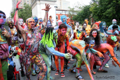 New York 8th annual Body Painting Day.cover 50 artists and models came out to showcase there talent and paint living canvasses after the painting portion of the event they all walked down 5th ave to Washington Square park to pose for photographs and then boarded a Double Decker bus to Bushwick Brooklyn to celebrate.