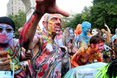 New York 8th annual Body Painting Day.cover 50 artists and models came out to showcase there talent and paint living canvasses after the painting portion of the event they all walked down 5th ave to Washington Square park to pose for photographs and then boarded a Double Decker bus to Bushwick Brooklyn to celebrate.