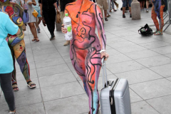 New York 8th annual Body Painting Day.cover 50 artists and models came out to showcase there talent and paint living canvasses after the painting portion of the event they all walked down 5th ave to Washington Square park to pose for photographs and then boarded a Double Decker bus to Bushwick Brooklyn to celebrate.