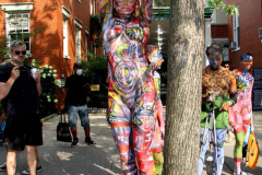New York 8th annual Body Painting Day.cover 50 artists and models came out to showcase there talent and paint living canvasses after the painting portion of the event they all walked down 5th ave to Washington Square park to pose for photographs and then boarded a Double Decker bus to Bushwick Brooklyn to celebrate.