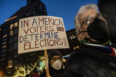 Demonstrators held a vigil in Verdi Square in the Upper West Side hosted by the Move on/Individuals Action group.  On Jan 6 Americans held candlelight vigils around the country supporting the voters right to decide the outcome of elections.
