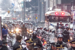 Funeral for NYPD Rookie Cop JASON RIVERA, was held at the St. Patrick’s Cathedral in Mid-Town Manhattan. 
RIVERA only 22, died in a routine domestic call in Manhattan along with another Officer, Wilbert Mora, 27. Thousands of NYPD officers attended as well as family members, friends and colleagues of now post-humously promoted, Detective JASON RIVERA. New York, NY (C) Bianca Otero