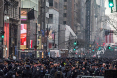 Funeral for NYPD Rookie Cop JASON RIVERA, was held at the St. Patrick’s Cathedral in Mid-Town Manhattan. 
RIVERA only 22, died in a routine domestic call in Manhattan along with another Officer, Wilbert Mora, 27. Thousands of NYPD officers attended as well as family members, friends and colleagues of now post-humously promoted, Detective JASON RIVERA. New York, NY (C) Bianca Otero