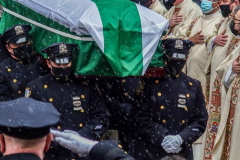 Funeral for NYPD Rookie Cop JASON RIVERA, was held at the St. Patrick’s Cathedral in Mid-Town Manhattan. 
RIVERA only 22, died in a routine domestic call in Manhattan along with another Officer, Wilbert Mora, 27. Thousands of NYPD officers attended as well as family members, friends and colleagues of now post-humously promoted, Detective JASON RIVERA. New York, NY (C) Bianca Otero