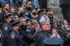 Funeral for NYPD Rookie Cop JASON RIVERA, was held at the St. Patrick’s Cathedral in Mid-Town Manhattan. 
RIVERA only 22, died in a routine domestic call in Manhattan along with another Officer, Wilbert Mora, 27. Thousands of NYPD officers attended as well as family members, friends and colleagues of now post-humously promoted, Detective JASON RIVERA. New York, NY (C) Bianca Otero