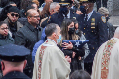 Funeral for NYPD Rookie Cop JASON RIVERA, was held at the St. Patrick’s Cathedral in Mid-Town Manhattan. 
RIVERA only 22, died in a routine domestic call in Manhattan along with another Officer, Wilbert Mora, 27. Thousands of NYPD officers attended as well as family members, friends and colleagues of now post-humously promoted, Detective JASON RIVERA. New York, NY (C) Bianca Otero