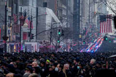 Funeral for NYPD Rookie Cop JASON RIVERA, was held at the St. Patrick’s Cathedral in Mid-Town Manhattan. 
RIVERA only 22, died in a routine domestic call in Manhattan along with another Officer, Wilbert Mora, 27. Thousands of NYPD officers attended as well as family members, friends and colleagues of now post-humously promoted, Detective JASON RIVERA. New York, NY (C) Bianca Otero