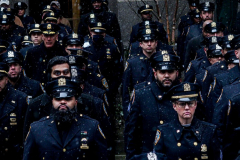 Funeral for NYPD Rookie Cop JASON RIVERA, was held at the St. Patrick’s Cathedral in Mid-Town Manhattan. 
RIVERA only 22, died in a routine domestic call in Manhattan along with another Officer, Wilbert Mora, 27. Thousands of NYPD officers attended as well as family members, friends and colleagues of now post-humously promoted, Detective JASON RIVERA. New York, NY (C) Bianca Otero