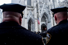 Funeral for NYPD Rookie Cop JASON RIVERA, was held at the St. Patrick’s Cathedral in Mid-Town Manhattan. 
RIVERA only 22, died in a routine domestic call in Manhattan along with another Officer, Wilbert Mora, 27. Thousands of NYPD officers attended as well as family members, friends and colleagues of now post-humously promoted, Detective JASON RIVERA. New York, NY (C) Bianca Otero