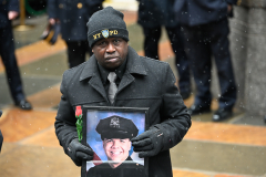 A supporter of the NYPD at the funeral for NYPD Officer Jason Rivera.
