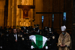 NYPD Officers carry the casket of fallen officer Jason Rivera.