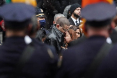 Family members, mourners