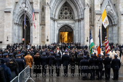Mourners are looking on as the hearse with the casket of NYPD officer Jason Rivera is set to leave St. Patrick’s Cathedral in New York, New York, on Jan. 28, 2022.  (Photo by Gabriele Holtermann/Sipa USA)