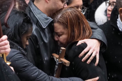 Relatives of fallen NYPD Officer Jason Rivera grieve during his funeral at St. Patrick's Cathedral on January 28, 2022 in New York City. The 22-year-old NYPD officer was shot and killed on January 21 in Harlem while responding to a domestic disturbance call. Rivera's partner, Officer Wilbert Mora, also died from injuries suffered in the shooting