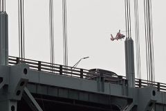 Tuesday, July 20, 2021
Verrazzano Bridge
Staten Island, NY
Photographs by Mary DiBiase Blaich

A woman was spotted jumping off the Brooklyn bound Verrazzano Bridge late Tuesday morning. Witnesses reported seeing her jump.  NYPD, FDNY and USCG searched the area under the bridge.  Video surveillance captured the incident.  A search was called to find the individual, including a US Coast Guard helicopter from Atlantic City who searched the area around the bridge.
The victim’s car was towed by MTBTA to their administration building as the search went on.