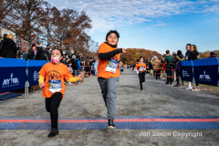 Rising New York Road Runners Cross Country event at Van Cortlandt Park Bronx, N.Y. on 1/21/21.  Runners from the ages 2 up to 18 spent a beautiful Sunday morning running in the park.  The youths ran 3 separate cross country heats.  The event was sponsored by New York Road Runners to promote youth running.  Copyright Jon Simon