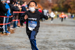 Rising New York Road Runners Cross Country event at Van Cortlandt Park Bronx, N.Y. on 1/21/21.  Runners from the ages 2 up to 18 spent a beautiful Sunday morning running in the park.  The youths ran 3 separate cross country heats.  The event was sponsored by New York Road Runners to promote youth running.  Copyright Jon Simon