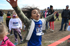 Rising New York Road Runners Cross Country event at Van Cortlandt Park Bronx, N.Y. on 1/21/21.  Runners from the ages 2 up to 18 spent a beautiful Sunday morning running in the park.  The youths ran 3 separate cross country heats.  The event was sponsored by New York Road Runners to promote youth running.  Copyright Jon Simon
