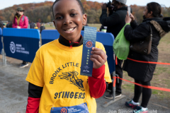 Rising New York Road Runners Cross Country event at Van Cortlandt Park Bronx, N.Y. on 1/21/21.  Runners from the ages 2 up to 18 spent a beautiful Sunday morning running in the park.  The youths ran 3 separate cross country heats.  The event was sponsored by New York Road Runners to promote youth running.  Copyright Jon Simon