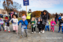 Rising New York Road Runners Cross Country event at Van Cortlandt Park Bronx, N.Y. on 1/21/21.  Runners from the ages 2 up to 18 spent a beautiful Sunday morning running in the park.  The youths ran 3 separate cross country heats.  The event was sponsored by New York Road Runners to promote youth running.  Copyright Jon Simon