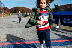 Rising New York Road Runners Cross Country event at Van Cortlandt Park Bronx, N.Y. on 1/21/21.  Runners from the ages 2 up to 18 spent a beautiful Sunday morning running in the park.  The youths ran 3 separate cross country heats.  The event was sponsored by New York Road Runners to promote youth running.  Copyright Jon Simon
