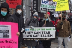 New York- Laundry workers rally  in Chinatown against a company who are trying to break the workers union.