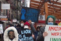 New York- Laundry workers rally  in Chinatown against a company who are trying to break the workers union.