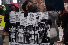 New York- Laundry workers rally  in Chinatown against a company who are trying to break the workers union.