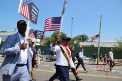 Mayor Adams and Paul Vallone marching in Little Neck Memorial Day Parade.